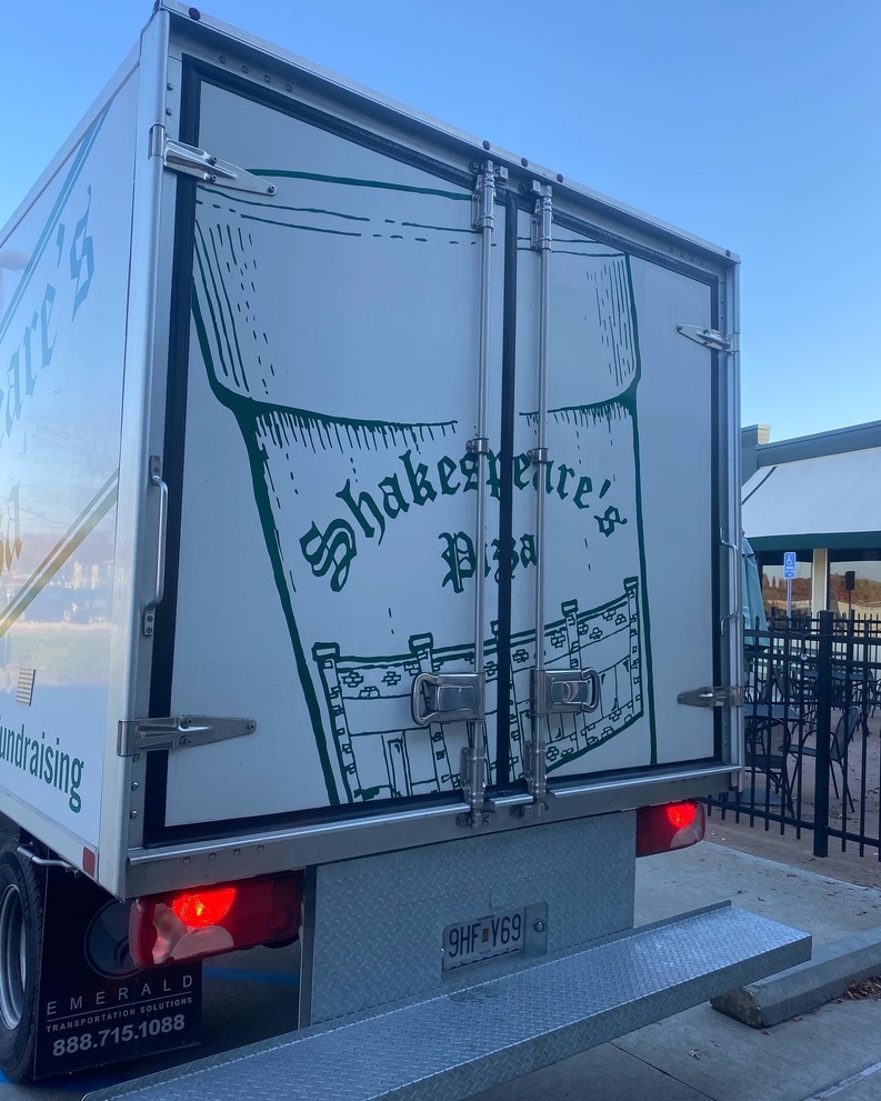 Back of a Shakespeare's Pizza truck